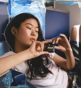 Girl on bench wearing Minor IV True Wireless Earbuds