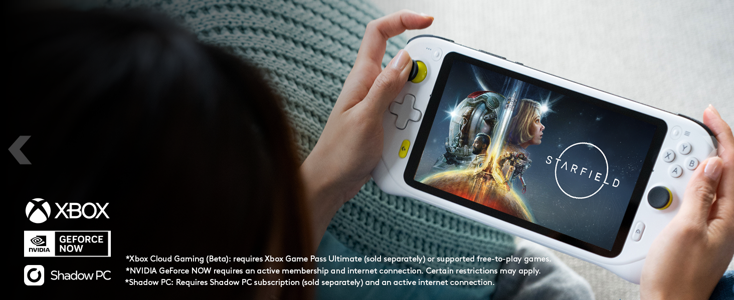 A woman playing on CLOUD Gaming Handheld on a couch